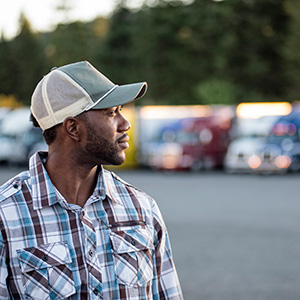 black man truck driver near his truck parked in a 2022 03 04 02 14 40 utc