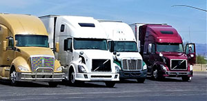 transportation and logistics a row of big rig trucks with enclosed trailers parked in the truck t20 mokeNE